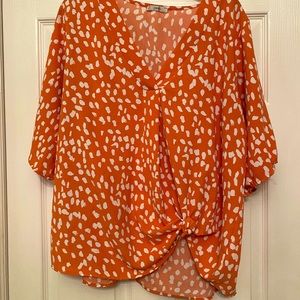 Orange animal print flowey blous size L